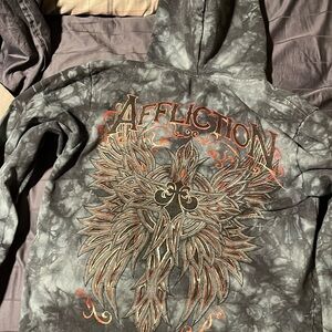 Never worn but has been washed twice.